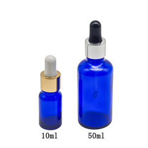 Botella de aceite esencial de vidrio azul vacía de 30 ml y 50 ml